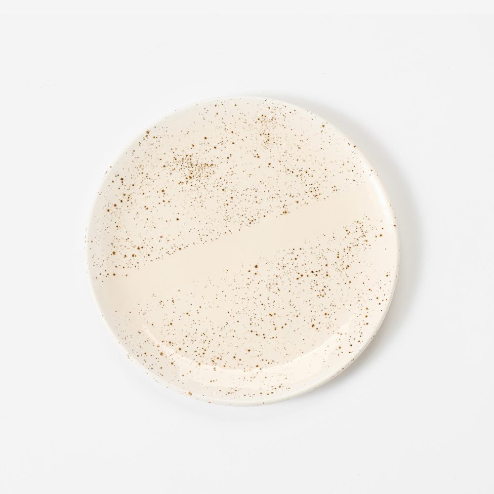 Handgemaakt dinerbord gespikkeld
